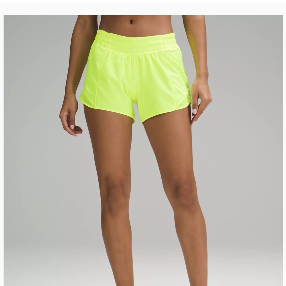 Lululemon Hotty Hot Low Rise Shirt 4" Lined in   Highlight Yellow color.